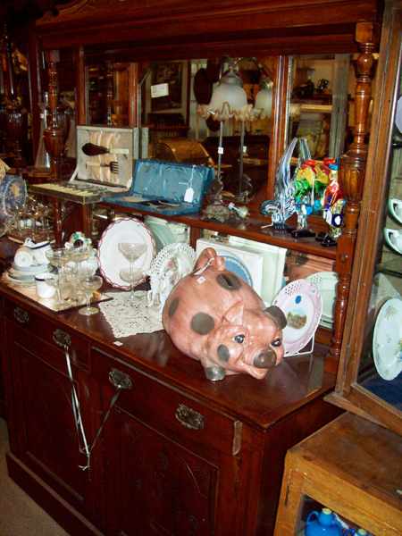 Appraisal: A TWO DOOR EDWARDIAN MIRROR BACK SIDEBOARD