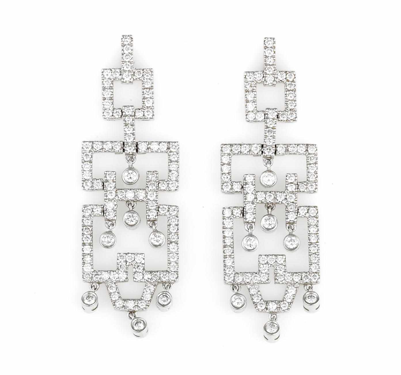 Appraisal: A pair of diamond pendant earrings estimated total diamond weight