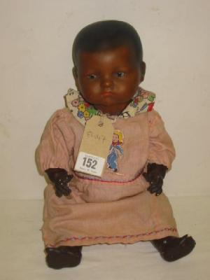 Appraisal: An Armand Marseille black bisque baby doll with brown sleeping