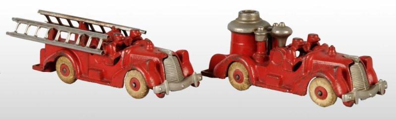 Appraisal: Lot of Cast Iron Fire Truck Toys Description Both have