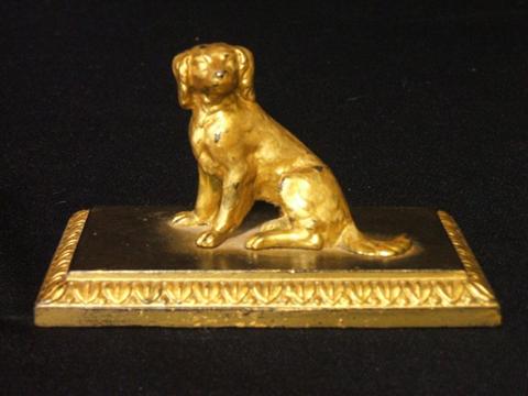 Appraisal: GILT- BRONZE FIGURE OF A SEATED DOG Probably a spaniel