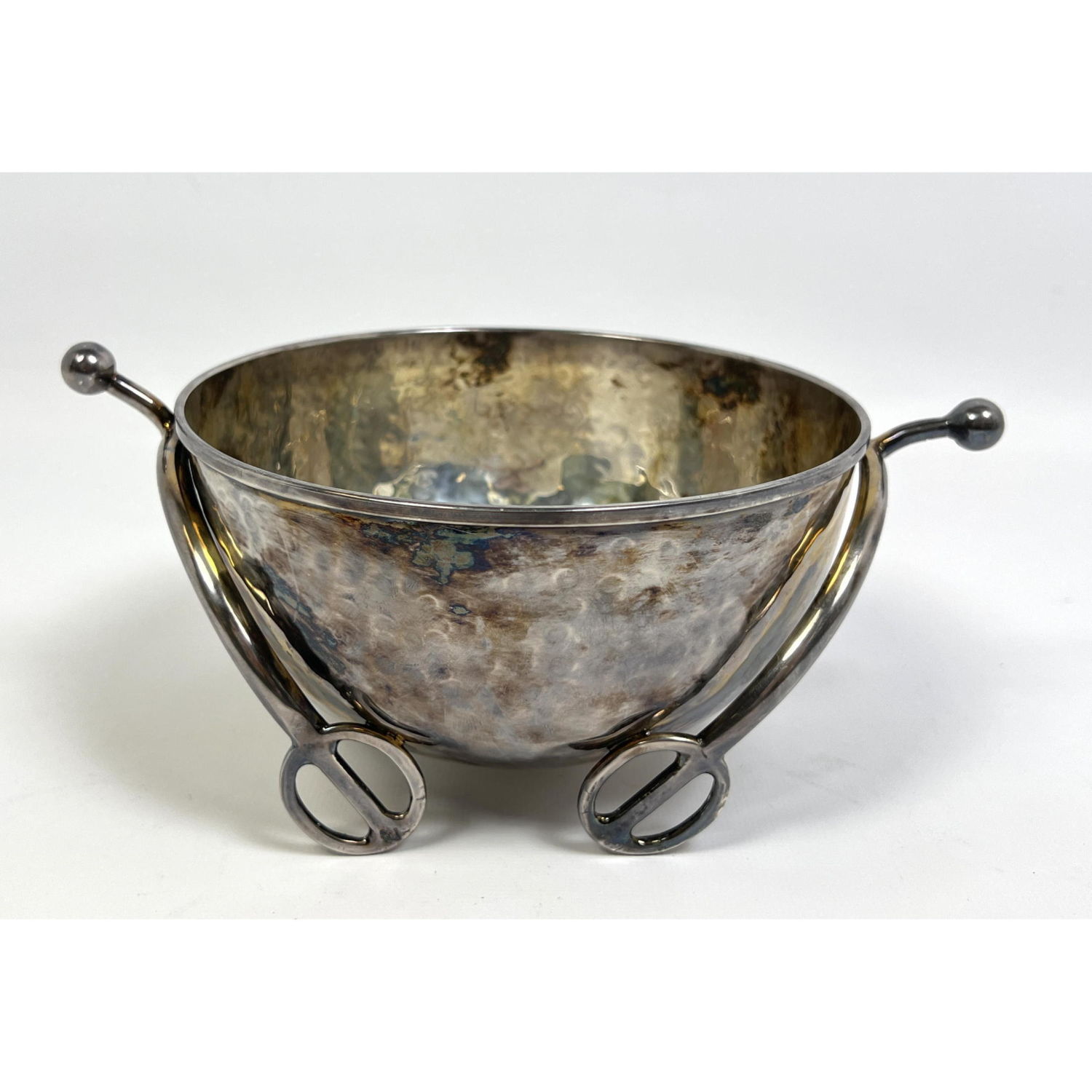 Appraisal: Mexican sterling hammered bowl with horse medallion and stirrups spurs