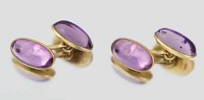 Appraisal: A Pair of Amethyst Cabochon Cufflinks k yellow gold cufflinks