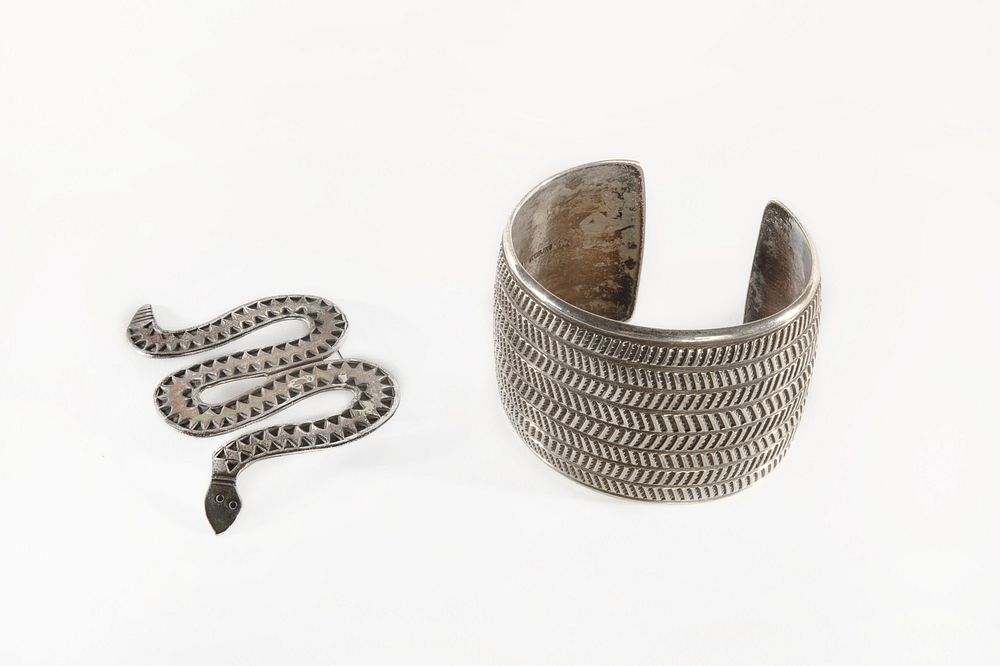 Appraisal: A Cippy Crazyhorse Sterling Silver Cuff Bracelet and Snake Brooch