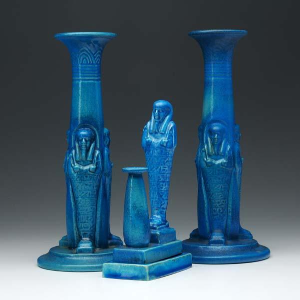 Appraisal: MARBLEHEAD Pair of candlesticks and incense burner in the Egyptian-revival