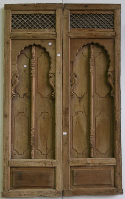 Appraisal: A pair of th century wooden window panels Rajasthan frame