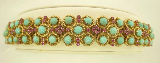 Appraisal: K Yellow Gold Lady's Turquoise and Ruby Bracelet hinged link