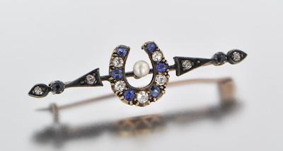 Appraisal: A Victorian Horseshoe Design Brooch with Gems Silver and yellow