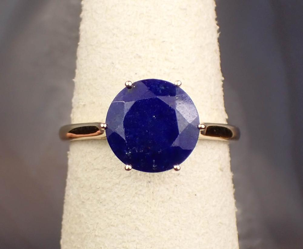 Appraisal: LAPIS LAZULI AND FOURTEEN KARAT GOLD RING The yellow gold