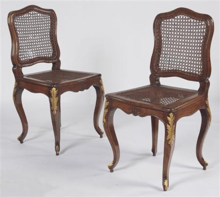 Appraisal: A pair of Louis XIV beechwood and parcel gilt side