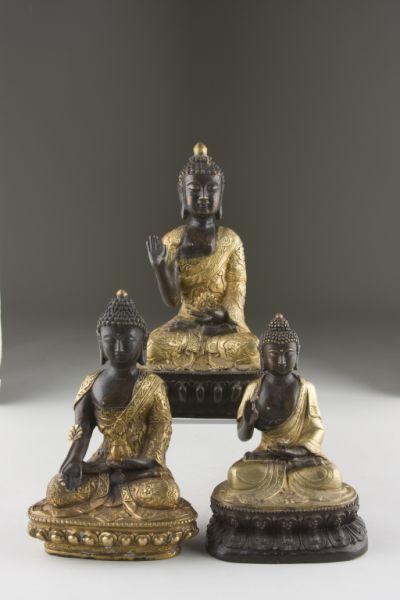 Appraisal: Three Tibetan Bronze Buddha Figures th c bronze with patination