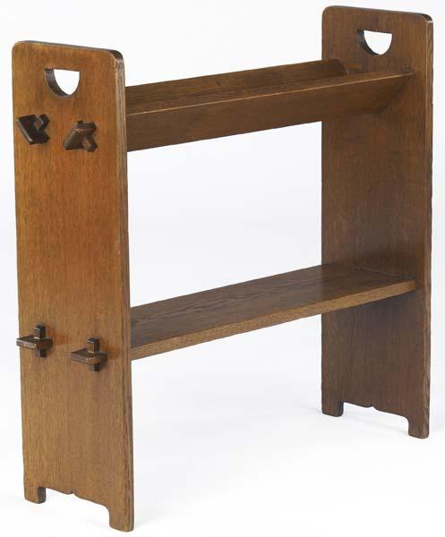 Appraisal: GUSTAV STICKLEY Book rack no with cut-out handles V trough