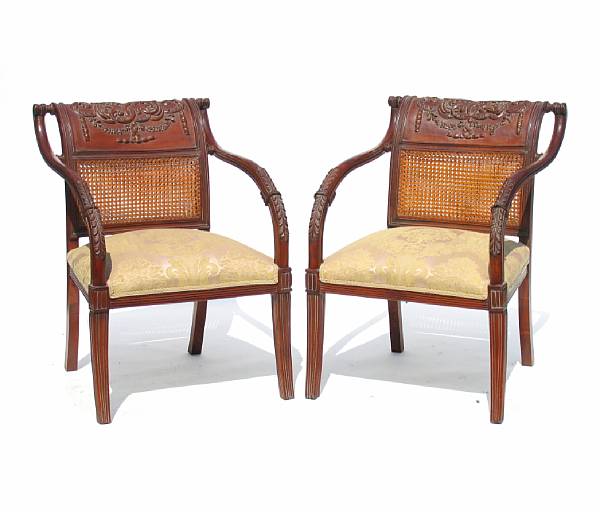 Appraisal: A pair of Italian style walnut armchairs height in width