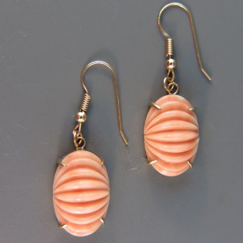 Appraisal: Carved Coral Earrings ribbed melon style k yellow gold wires