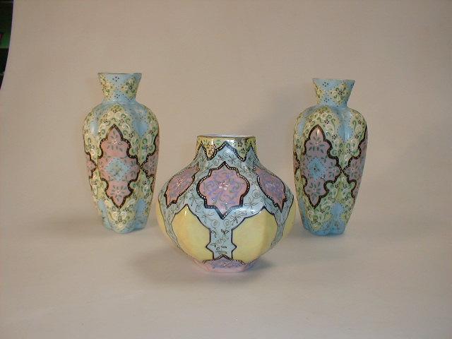 Appraisal: A pair of French thc enamelled vases of Islamic design