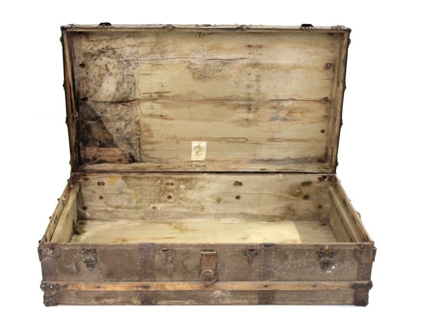 Appraisal: E G Woodward Lothrop Canvas Metal Trunk Featured in this