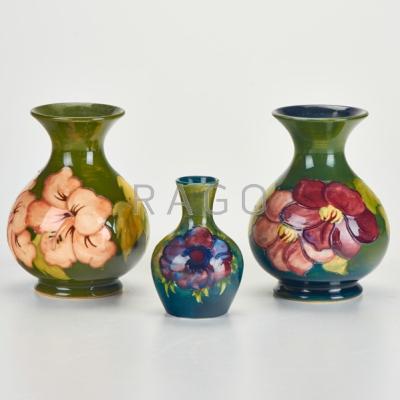 Appraisal: MOORCROFT Three cabinet vases two Hibiscus and one Anemone on