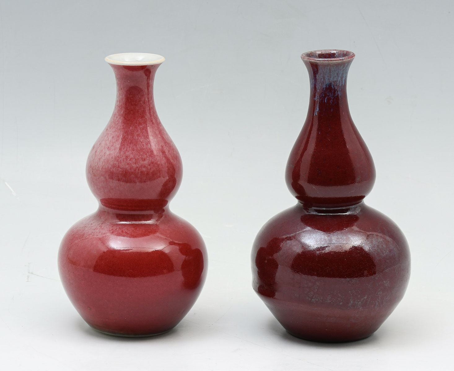 Appraisal: PC CHINESE DOUBLE GOURD VASES Chinese red glazed porcelain vases