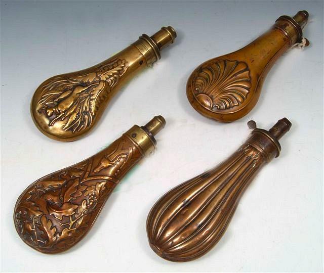 Appraisal: A JAMES DIXON BRASS GUN POWDER FLASK with fluted decoration