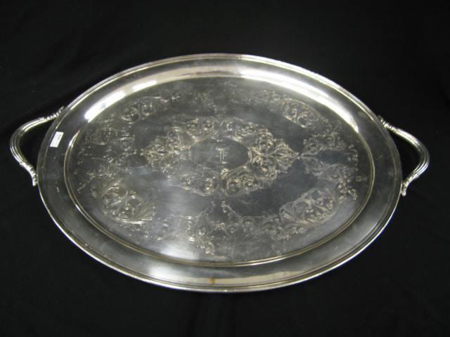 Appraisal: Silverplate Large Oval Serving Tray fancy engraved design