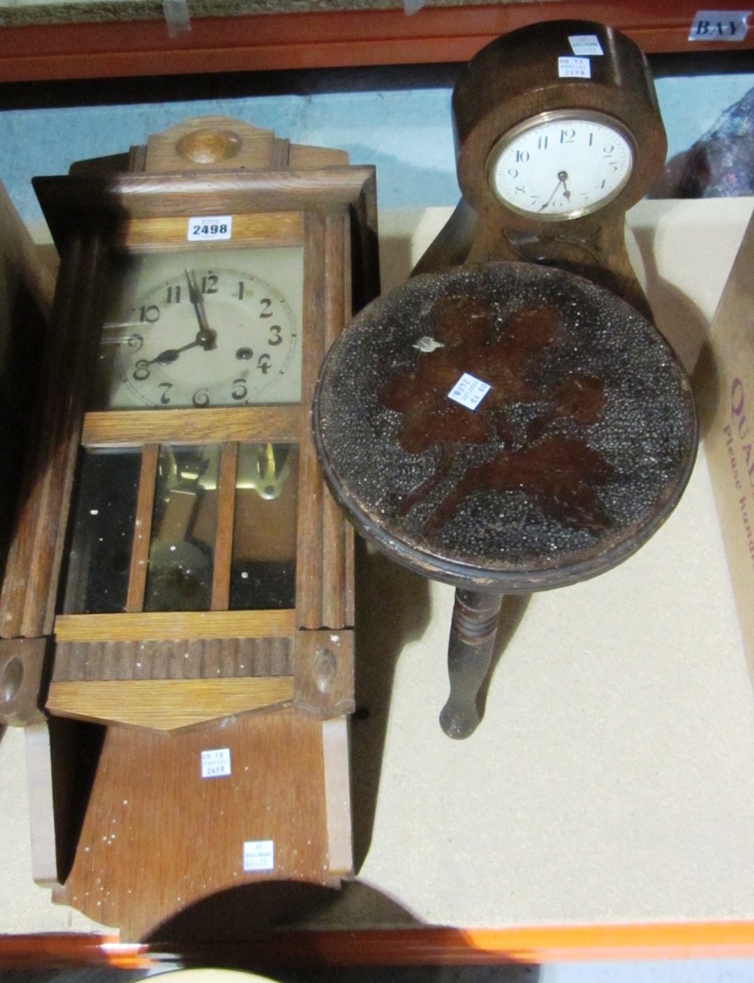 Appraisal: A th century oak mounted wall clock with another oak