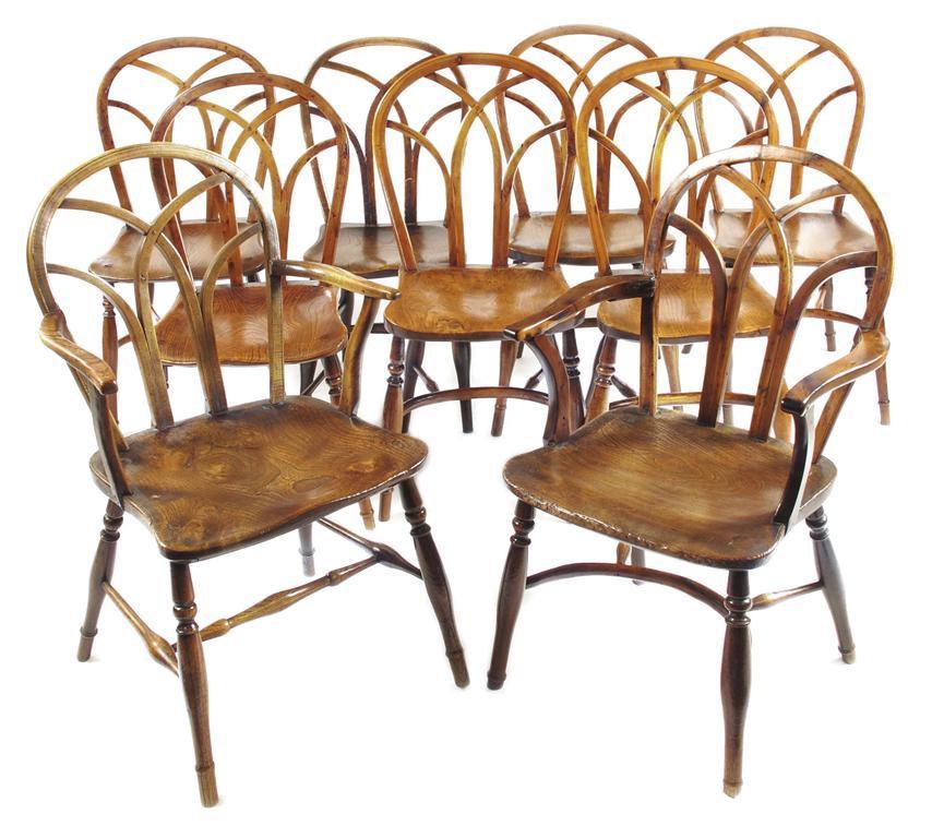 Appraisal: A harlequin set of nine Windsor Gothic arch back chairs