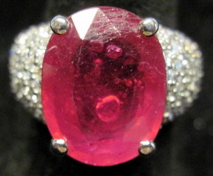 Appraisal: karat white gold ruby and diamond ring Oval prong set