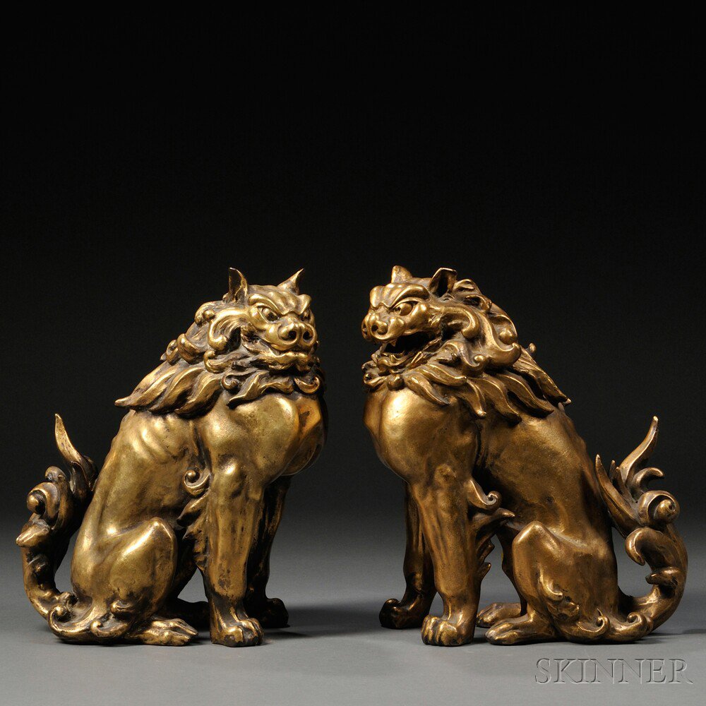 Appraisal: Pair of Gilt-bronze Komainu Japan th th century seated with