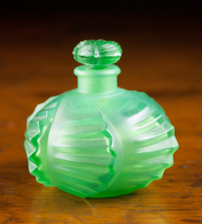 Appraisal: RENE LALIQUE CAMILE GLASS SCENT BOTTLE Art Deco motif green