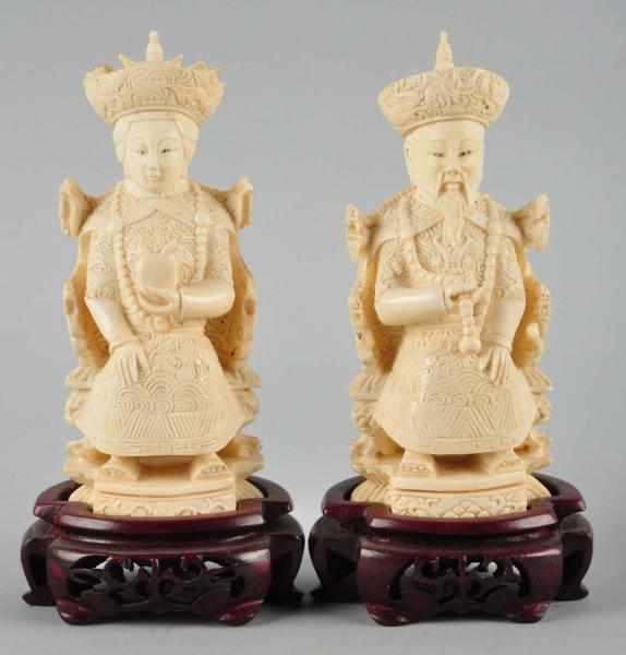 Appraisal: Pair of Solid Ivory Chinese Figures Description Seated man and