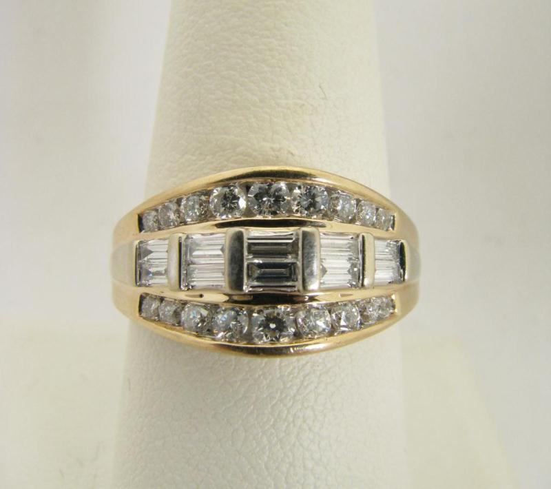 Appraisal: Lady's k Yellow Gold ct Total Weight Diamond Fashion Ring