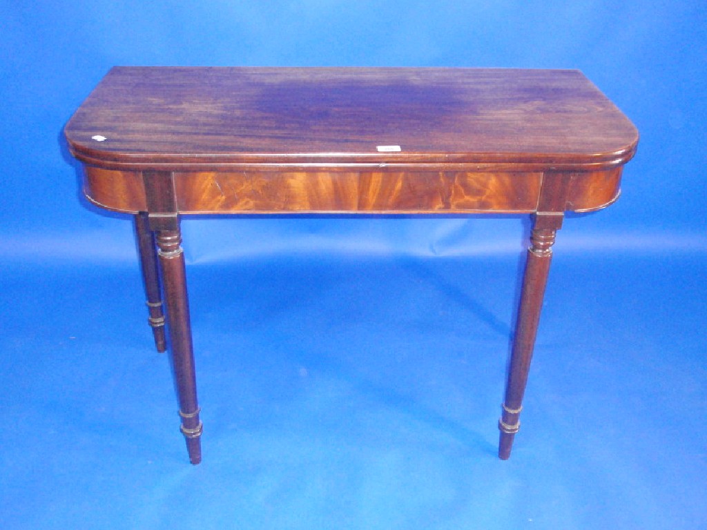 Appraisal: A William IV mahogany tea table with rounded rectangular folding