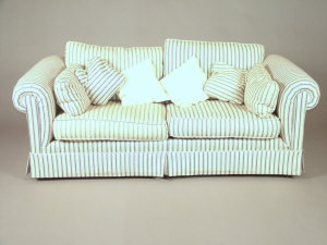 Appraisal: A blue and cream upholstered two seater sofa th century