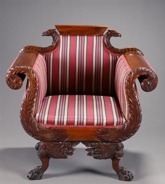 Appraisal: LATE CLASSICAL-STYLE ARMCHAIR American or European th century mahogany Carved