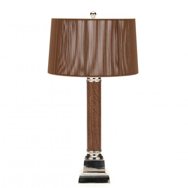 Appraisal: CHROME AND LEATHER COLUMNAR TABLE LAMP Contemporary light brown leather