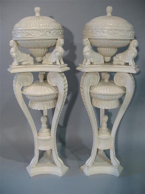 Appraisal: PAIR GRAND DOROTHY DRAPER STYLE COVERED URNS Each elaborately carved