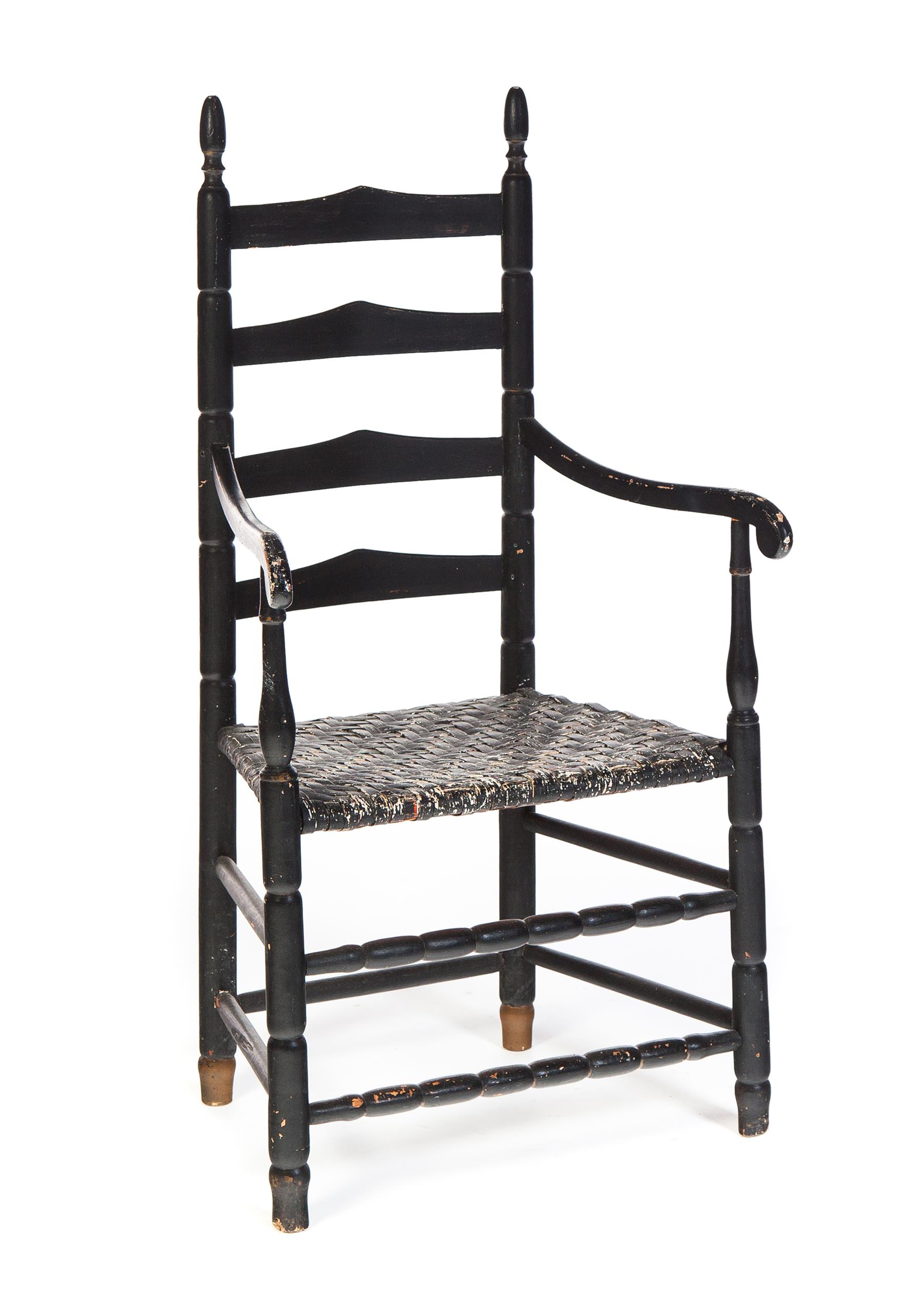 Appraisal: PAINTED LADDER-BACK ARMCHAIR American st quarter- th century Turned finials