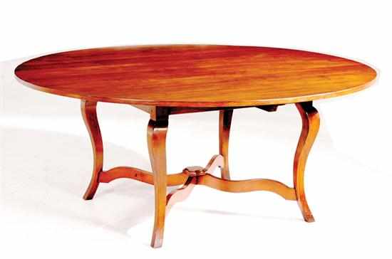 Appraisal: French Provincial style cherry farm table circular top above square