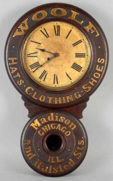 Appraisal: Woolf Clothing Baird Clock Description Circa Beautiful clock Surface appears