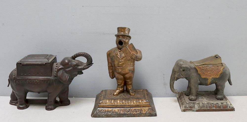 Appraisal: Smoking Collectible Lot Of Assorted To include an Elephant metal