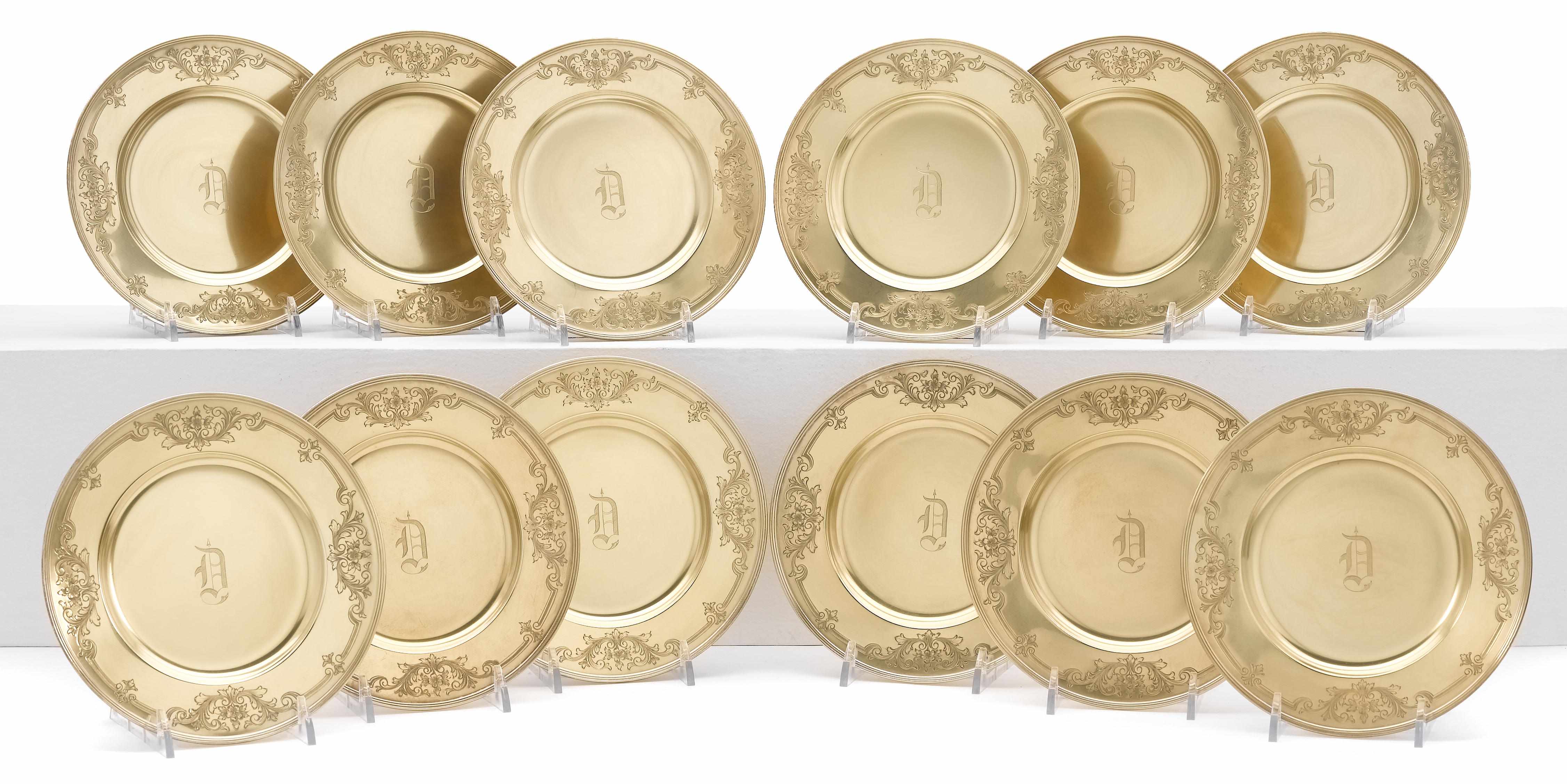 Appraisal: A sterling-gilt set of thirty six bread and butter plates