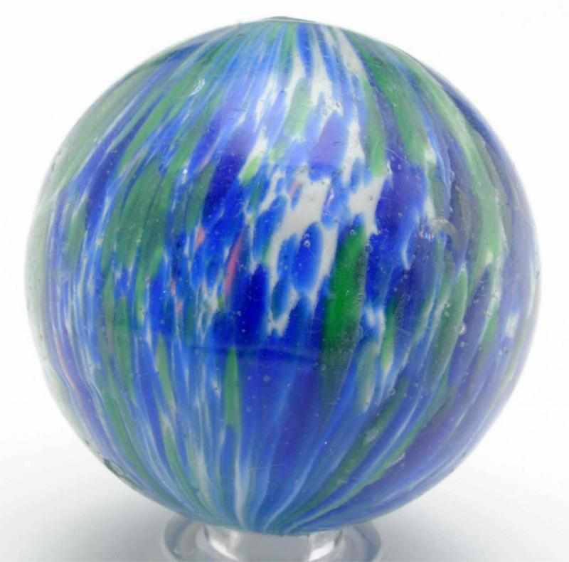 Appraisal: Multicolored Onionskin Marble White base with green and blue spotting