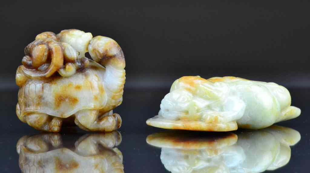 Appraisal: Chinese Carved Jade Figural GroupingsOne finely carved to depict a