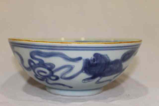 Appraisal: A CHINESE MING PROVINCIAL PORCELAIN CIRCULAR BOWL decorated with blue