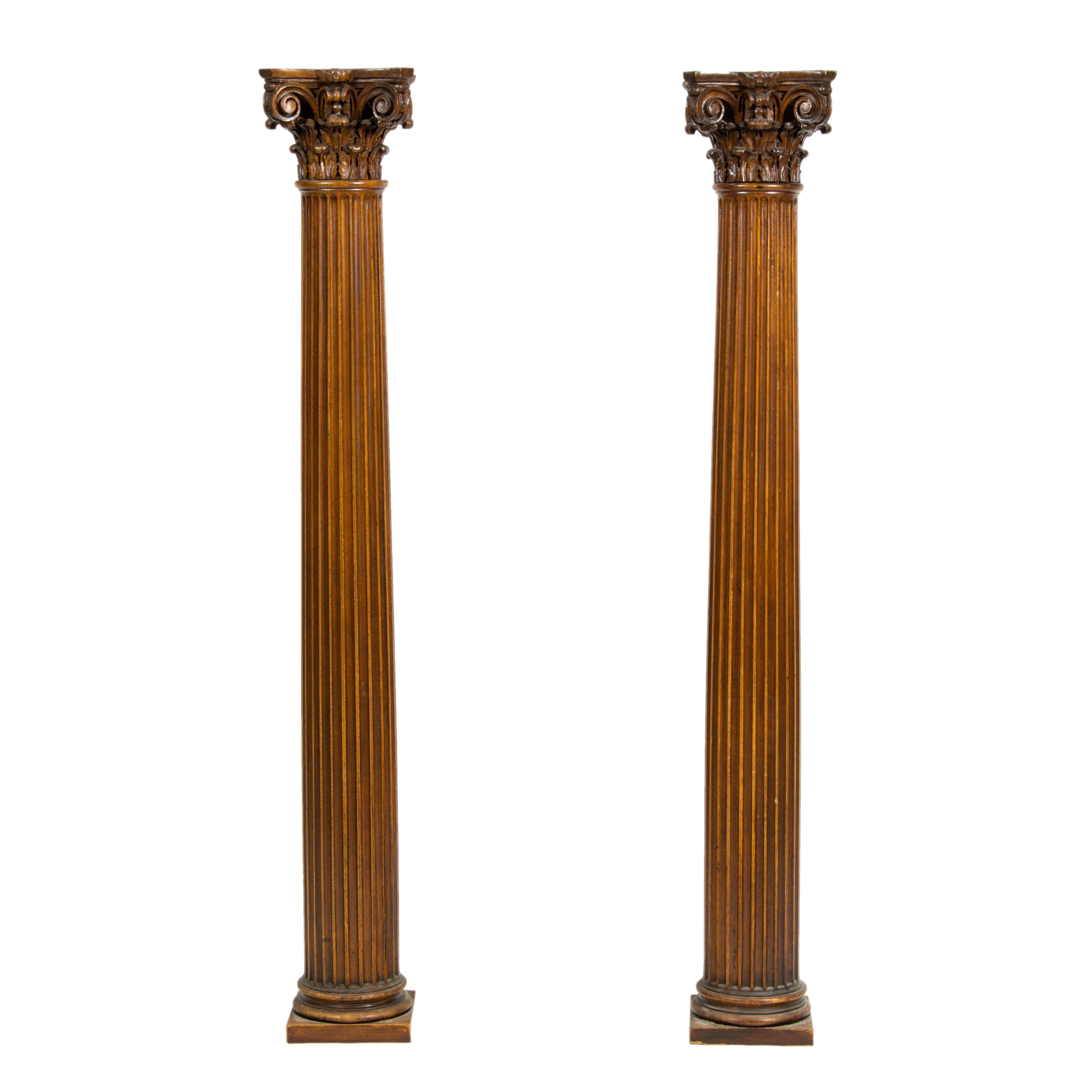 Appraisal: A PAIR OF CONTINENTAL CARVED AND FLUTED COLUMNS CIRCA A