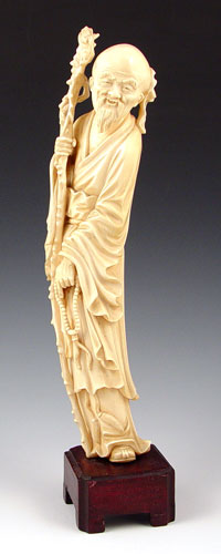 Appraisal: CHINESE CARVED IVORY FIGURE Priest with beads and cane Unsigned