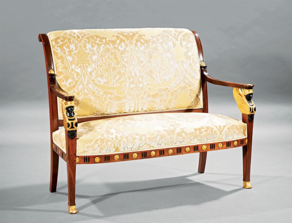 Appraisal: Empire-Style Carved Ebonized and Gilded Mahogany Settee th c Egyptianesque