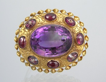 Appraisal: A Victorian Amethyst Brooch Victorian design brooch set to the