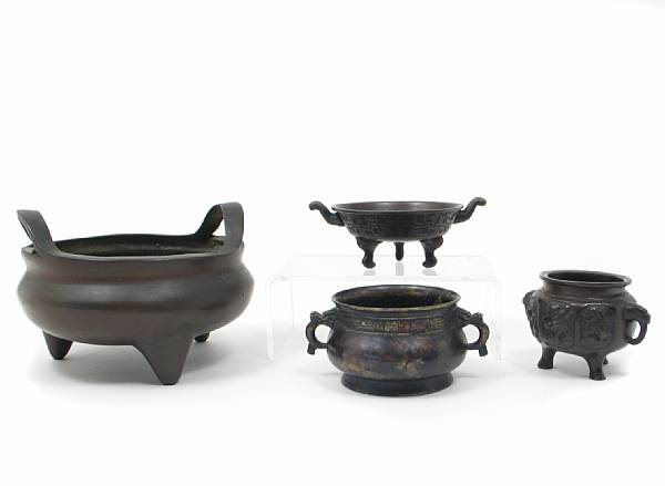 Appraisal: A group of eight Chinese patinated metal censers some bearing