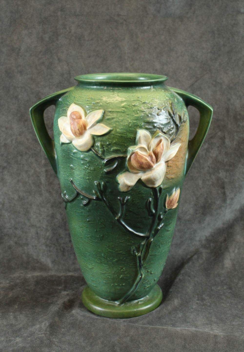 Appraisal: LARGE ROSEVILLE ART POTTERY VASE Magnolia pattern on dark green